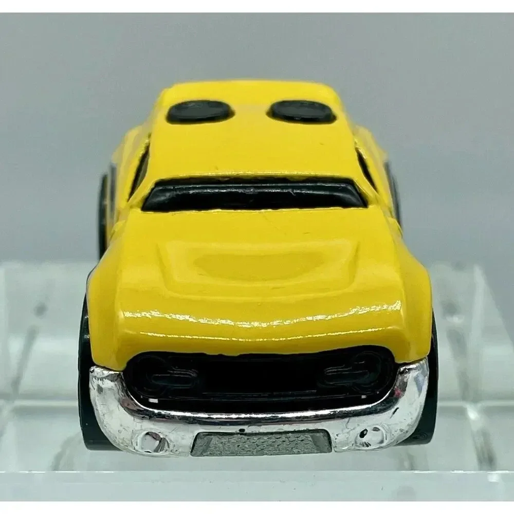 Hot Wheels 2007 Yellow Rocket Box with Black & Silver Flames‎ 2” Long